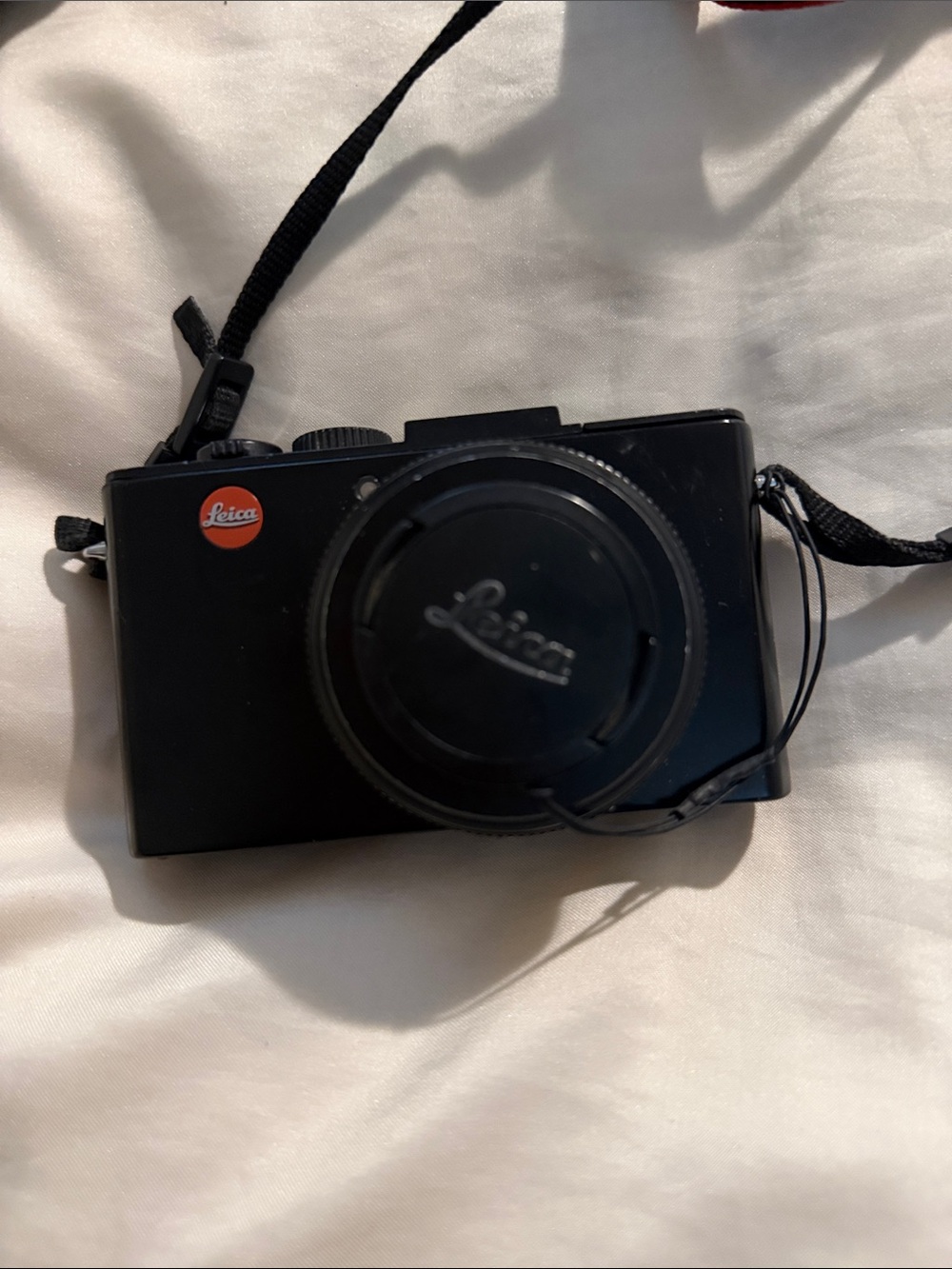 Leica Compact Digital Camera in Black with Red Logo
